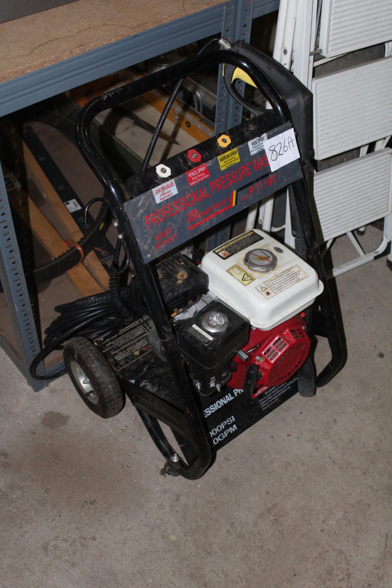 Petrol pressure washer.