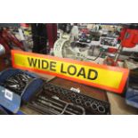 Wide load sign.