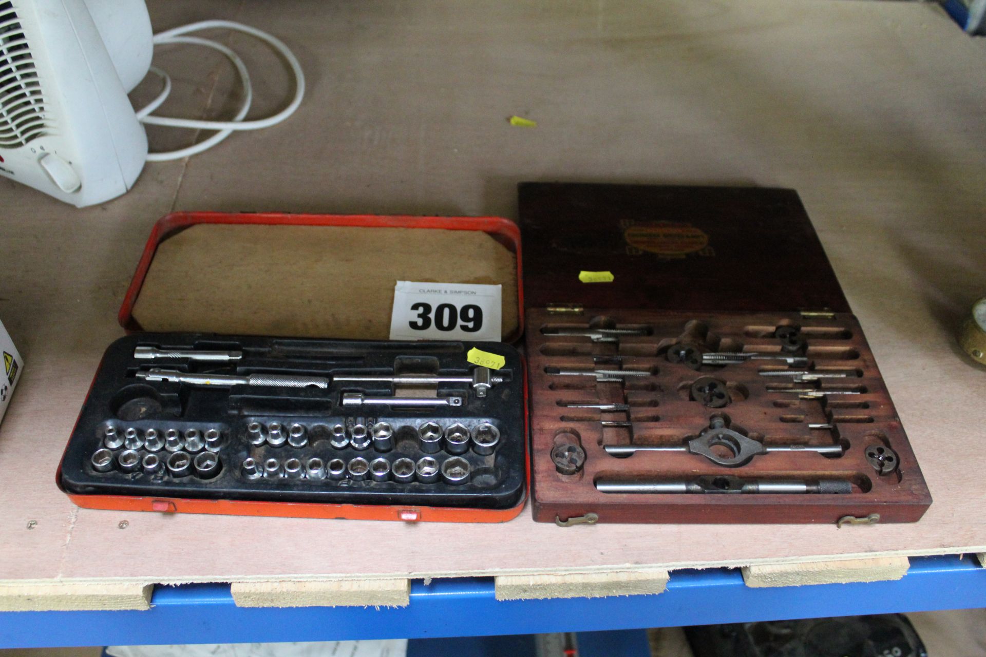 Socket set and wooden box of stocks and dies.