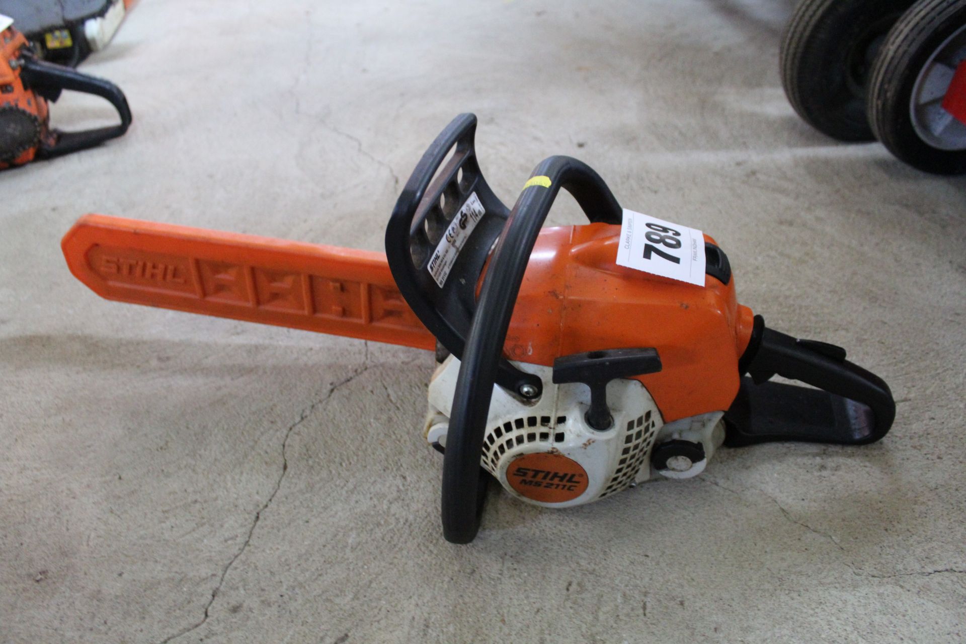 Stihl MS211C petrol chainsaw.