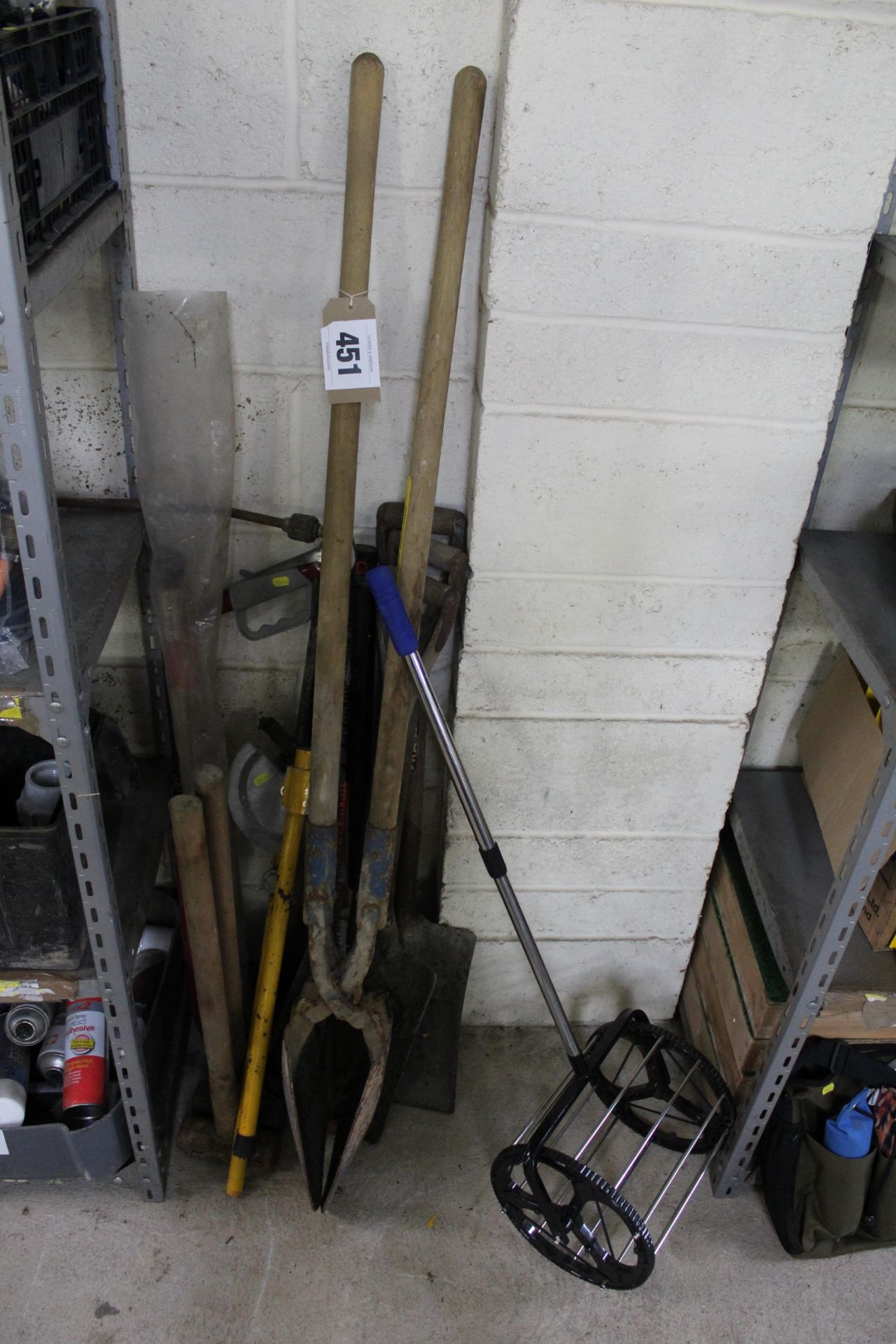 Various hand tools to include shovels, post spade, pipe bender, sledgehammers etc.