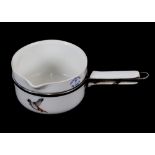 A graduated set of French porcelain cookware sauce