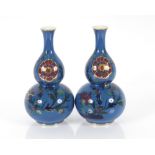 A pair of Lawleys double gourd shaped vases with f