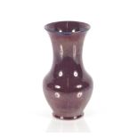 A Moorcroft purple lustre vase of baluster form ci