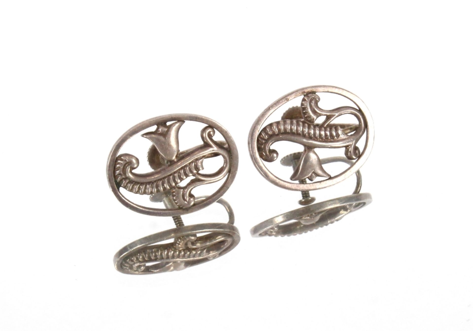 A pair of silver George Tarrett ear-rings of folia