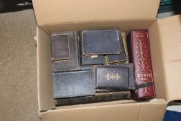A box containing Bibles, Church Service books etc.