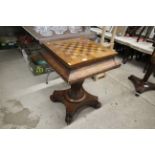 A 19th Century mahogany and inlaid games table