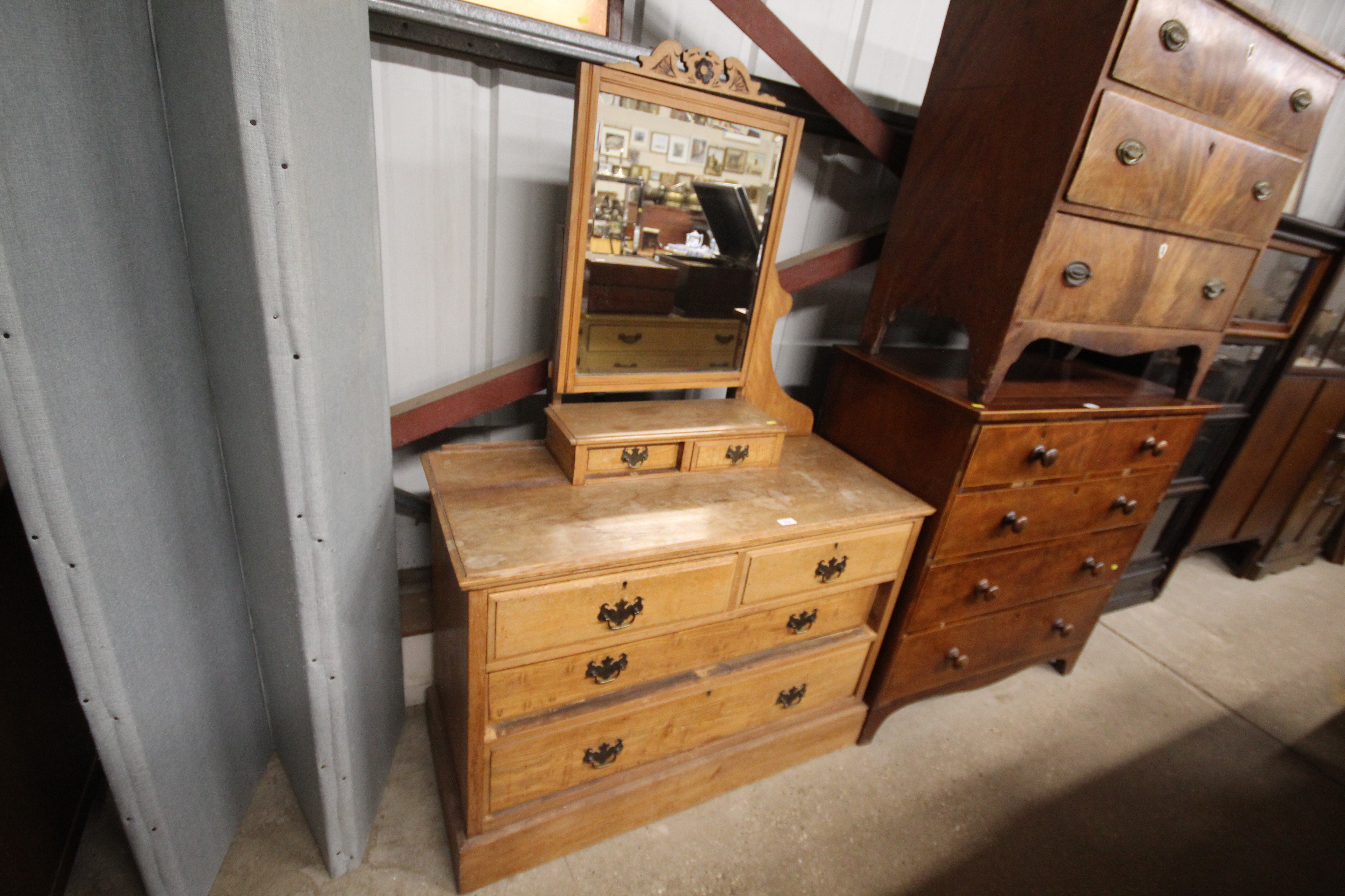 A late Victorian satin walnut dressing chest