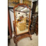 A large Victorian mahogany cheval mirror