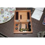 A 19th Century mahogany cased student microscope w