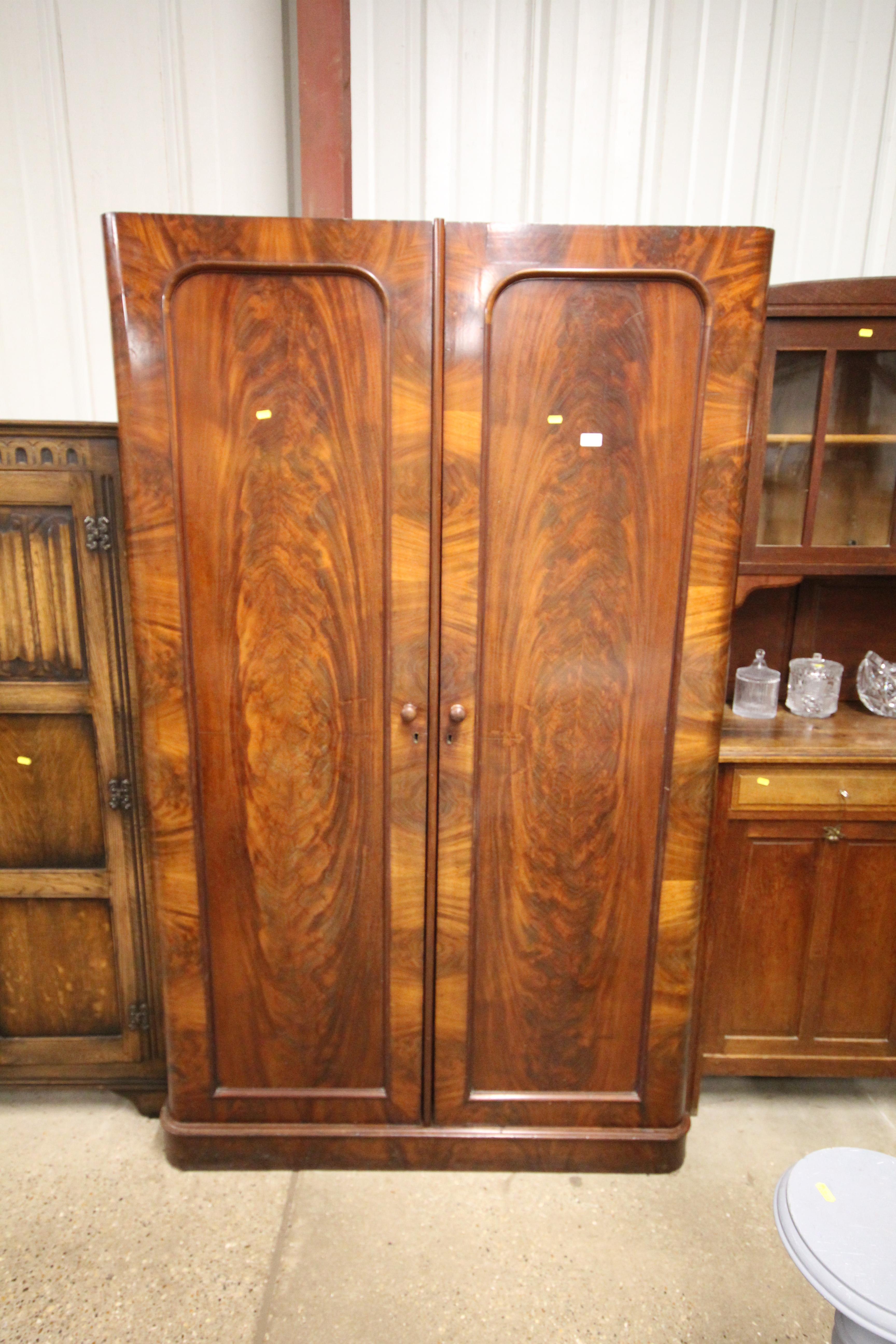 A large Victorian mahogany combination wardrobe, t