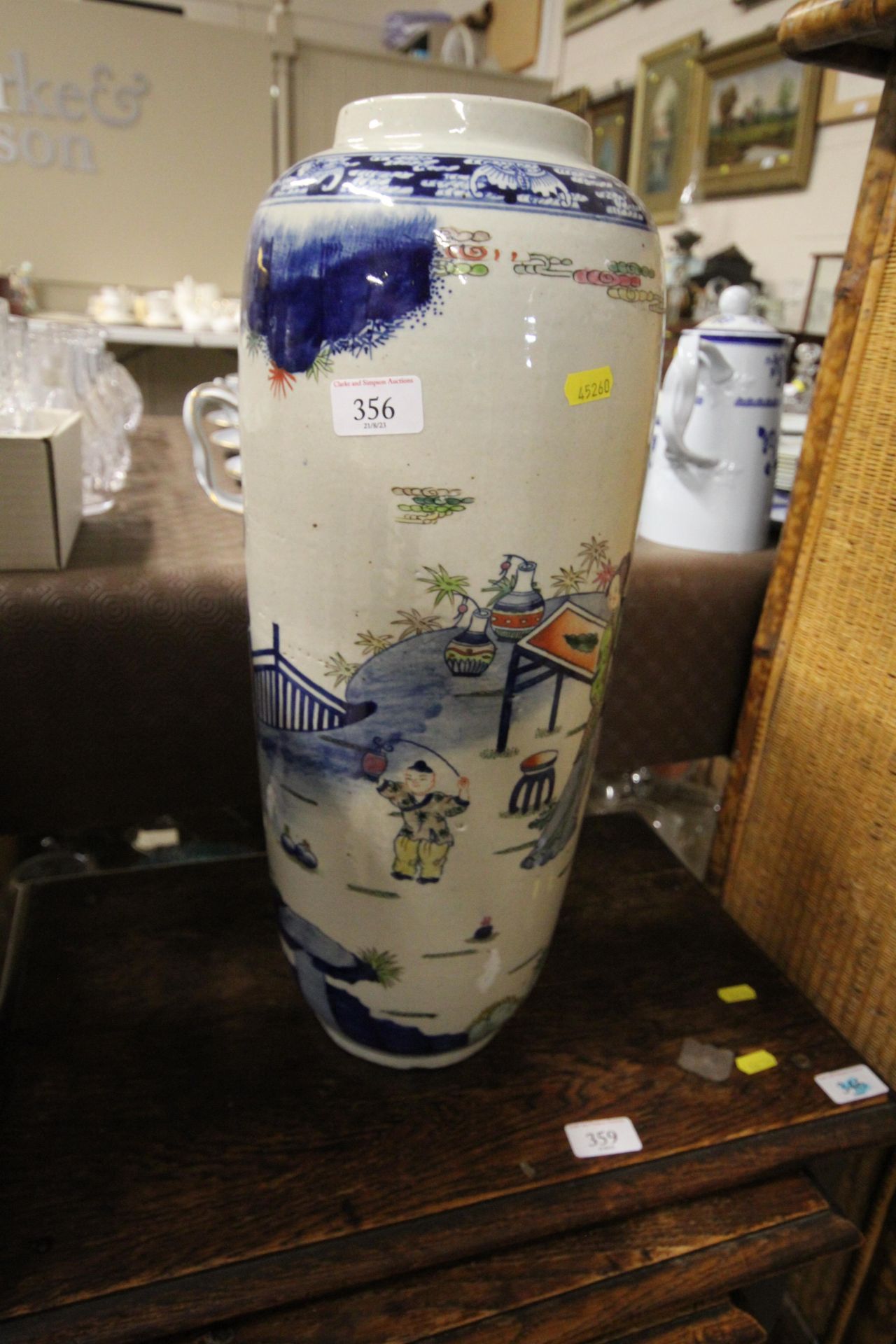 A large Chinese vase with decoration of figures an