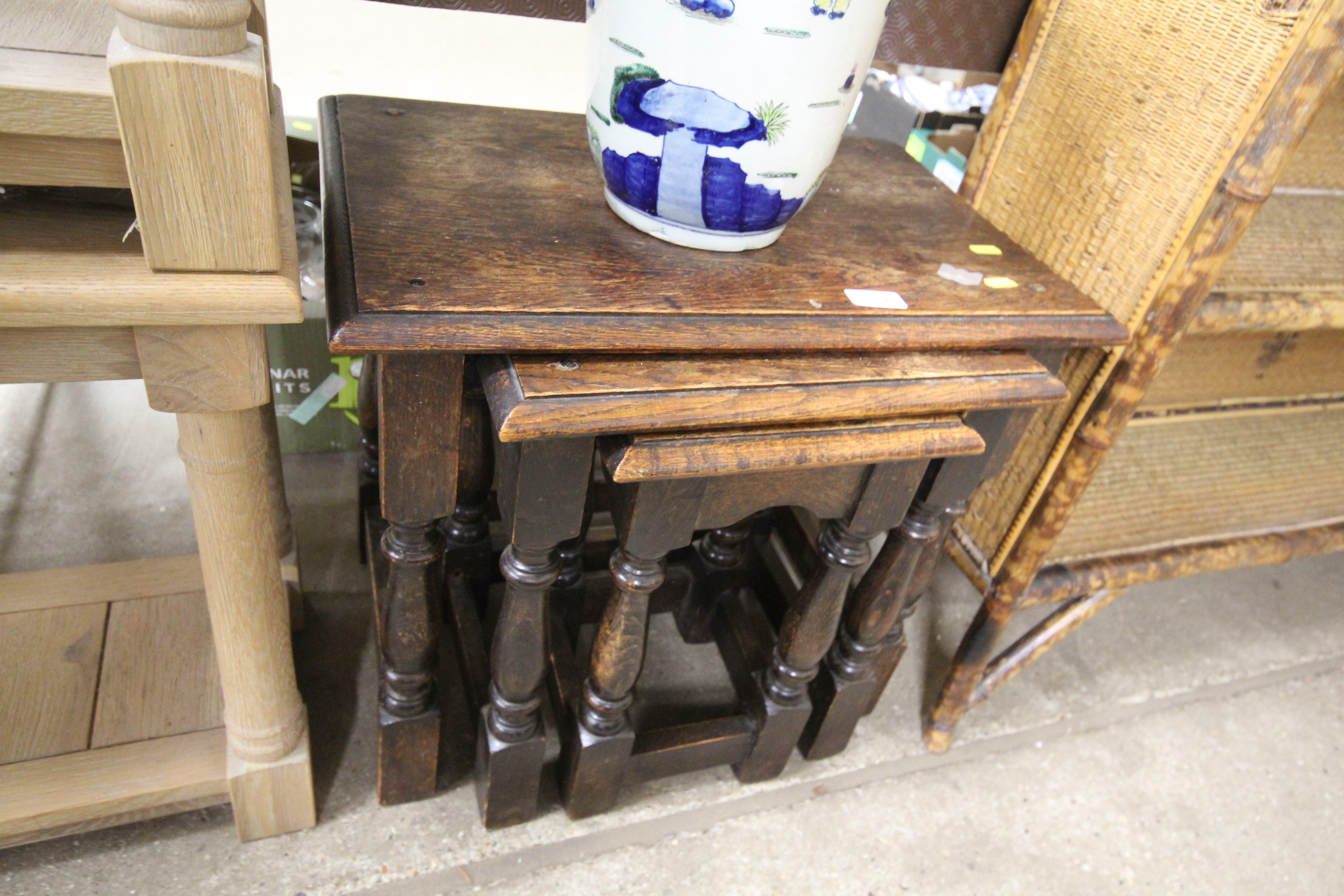 A set of three oak occasional coffee tables