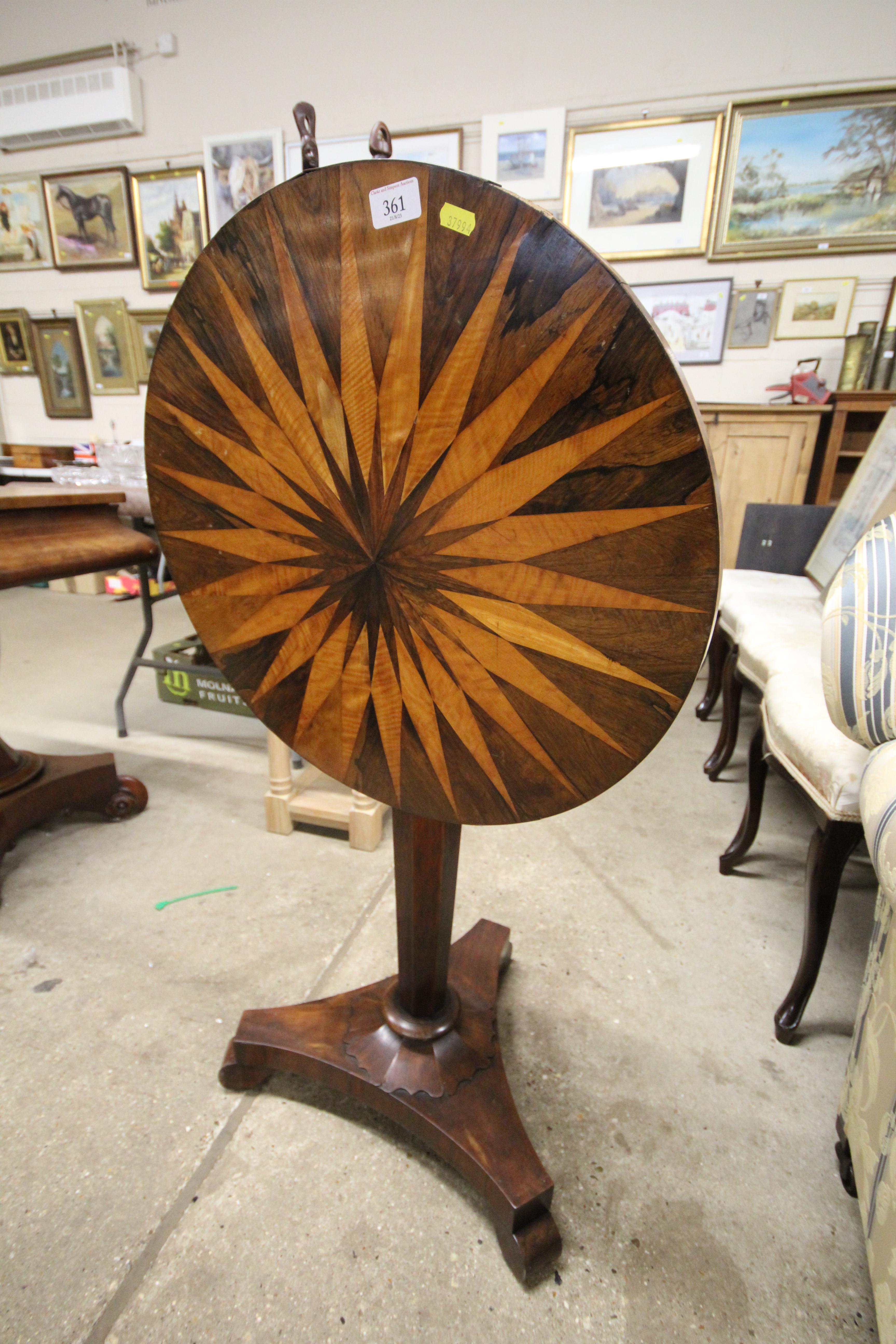 A 19th Century inlaid circular snap top occasional