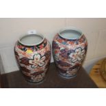 A pair of Japanese Imari baluster vases AF