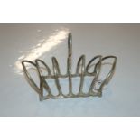 A silver six division toast rack, approx. 120gms, Birmingham 1929