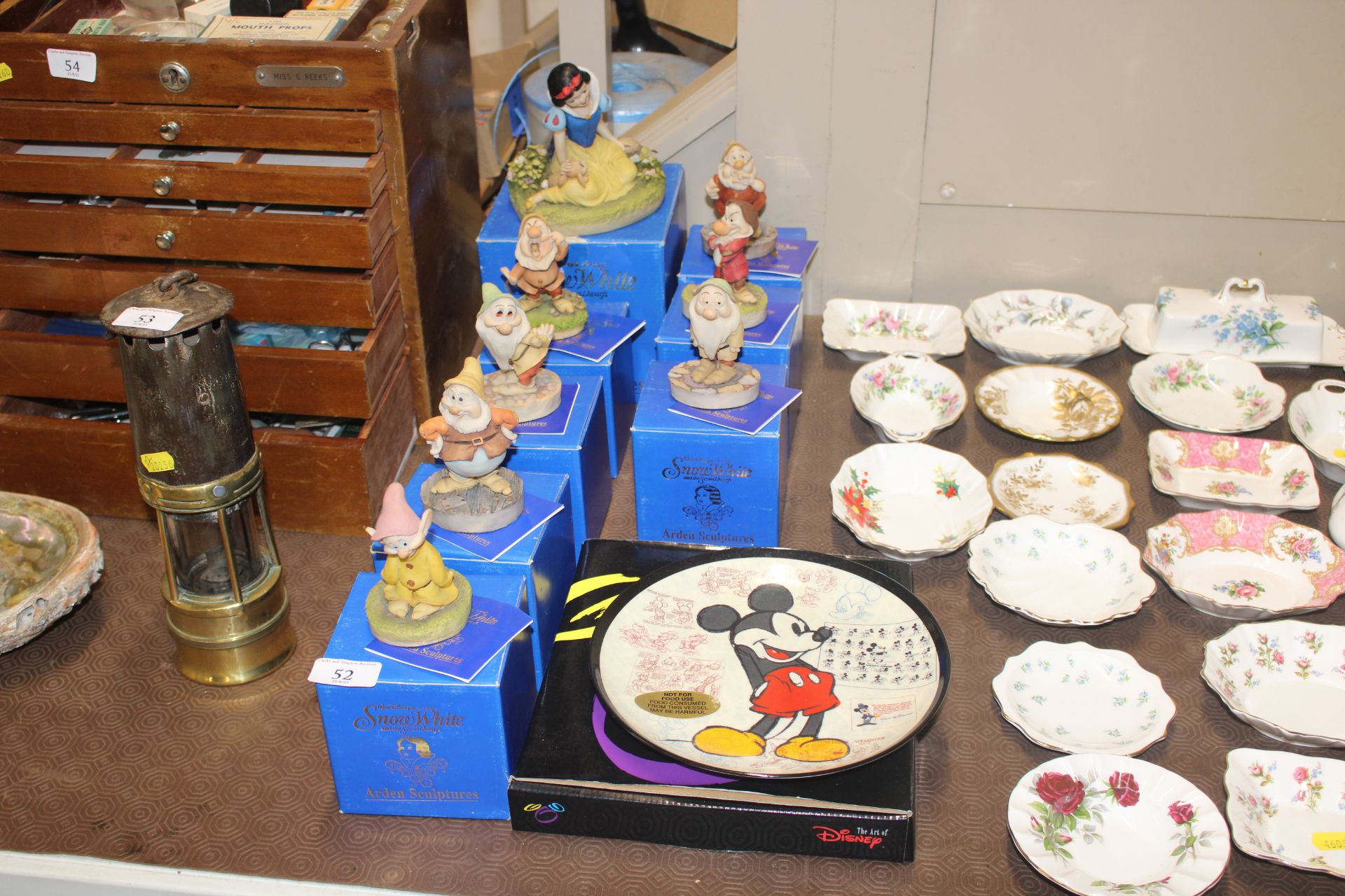 A collection of Arden "Snow White" sculptures with