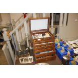A multi drawer dentists cabinet and contents