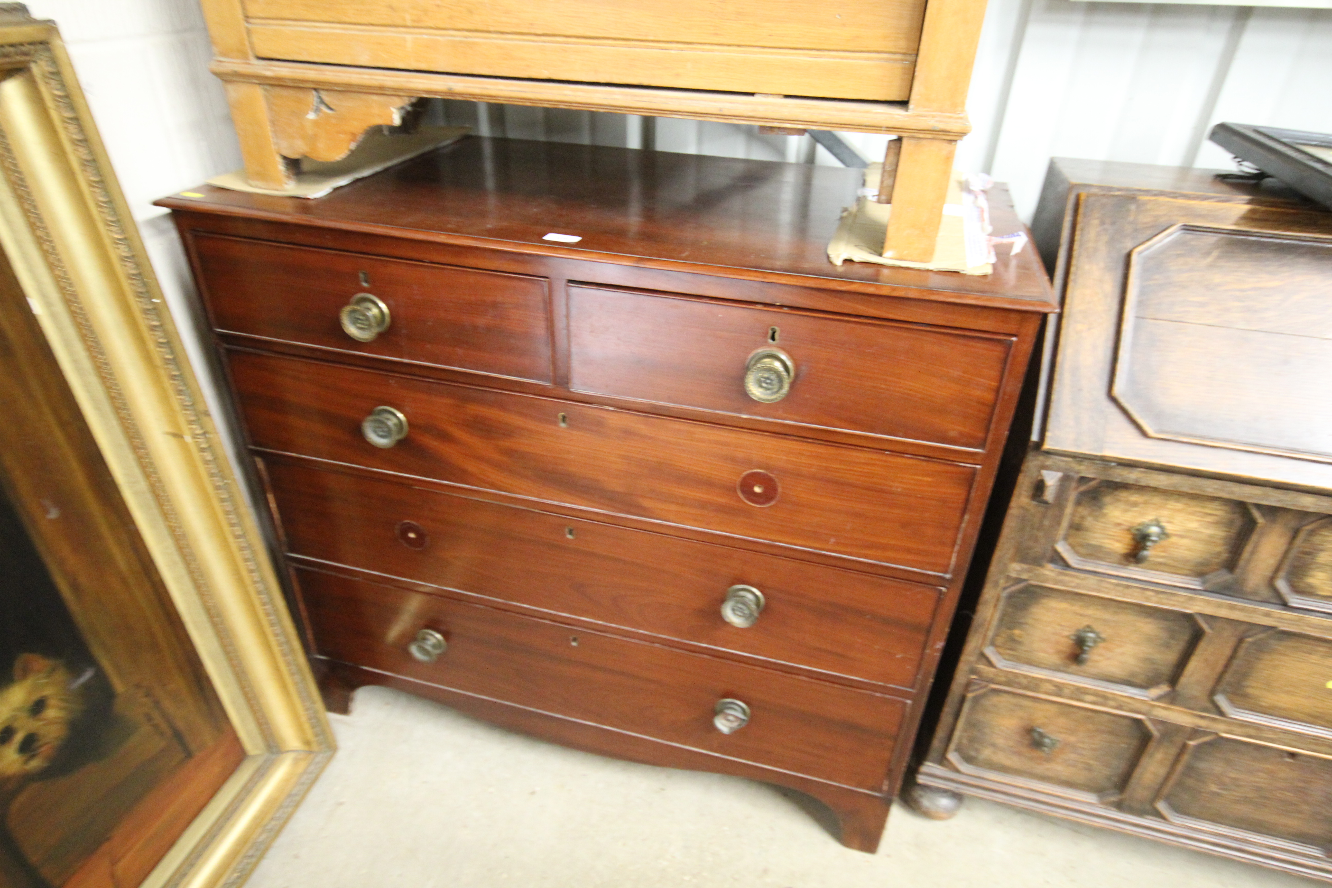 A 19th Century mahogany chest of two short and thr