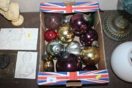 A collection of coloured Mercury glass balls and d