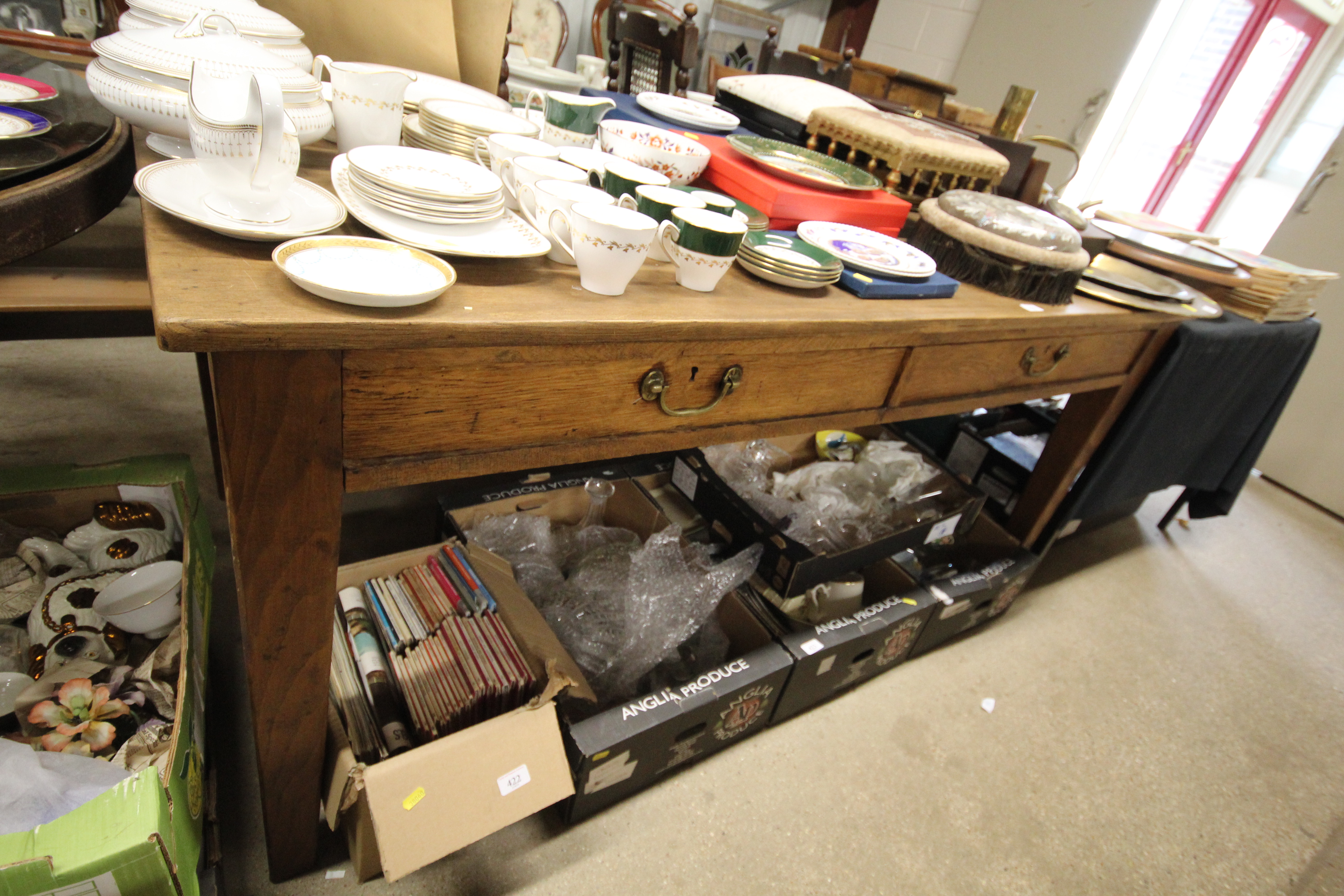 A large early 20th Century oak office table fitted