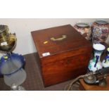 A mahogany decanter box with sunken brass handle a