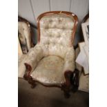 A Victorian oak framed spoon back armchair