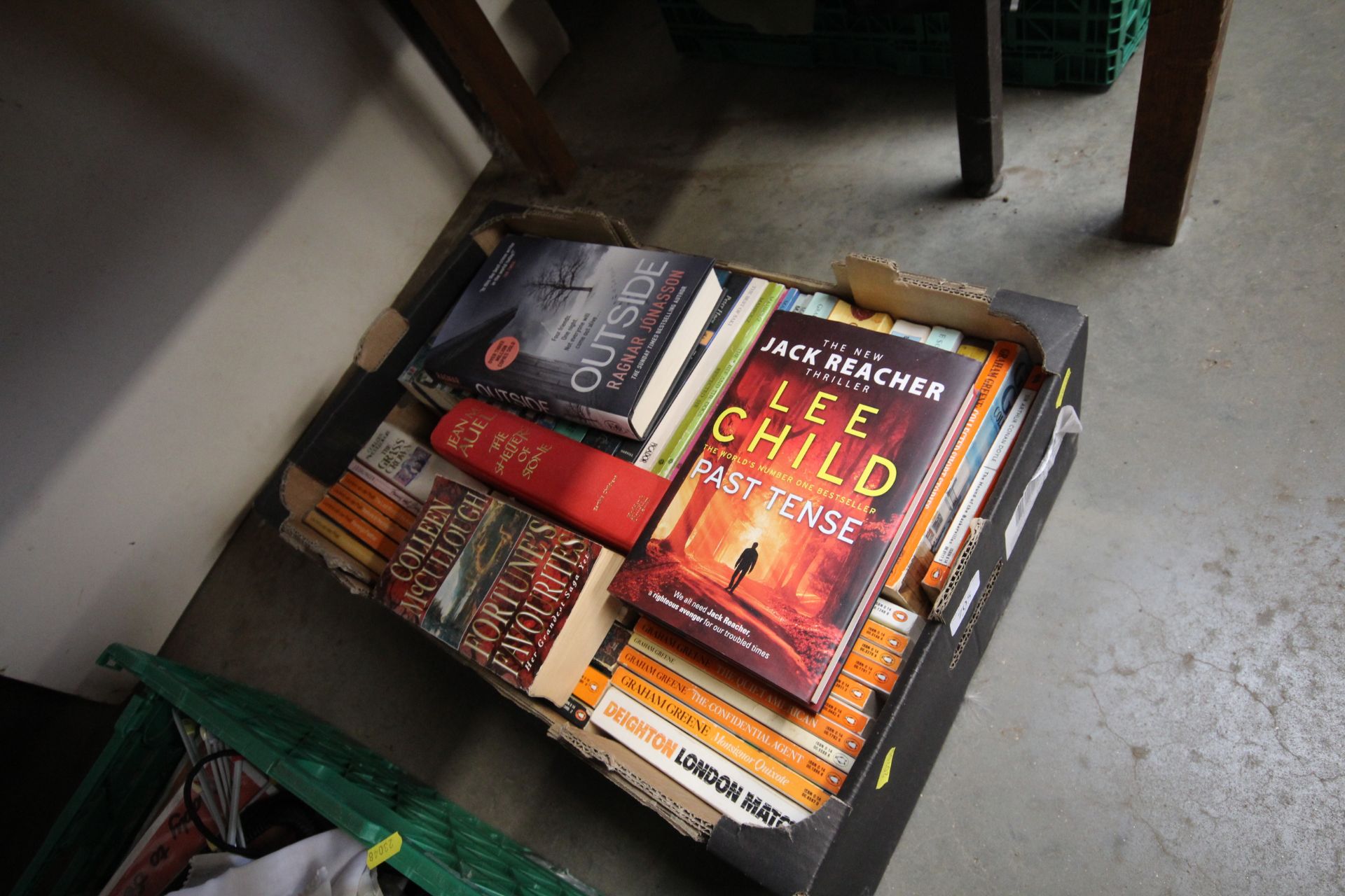 A box containing various hardback and other Penguin books etc.