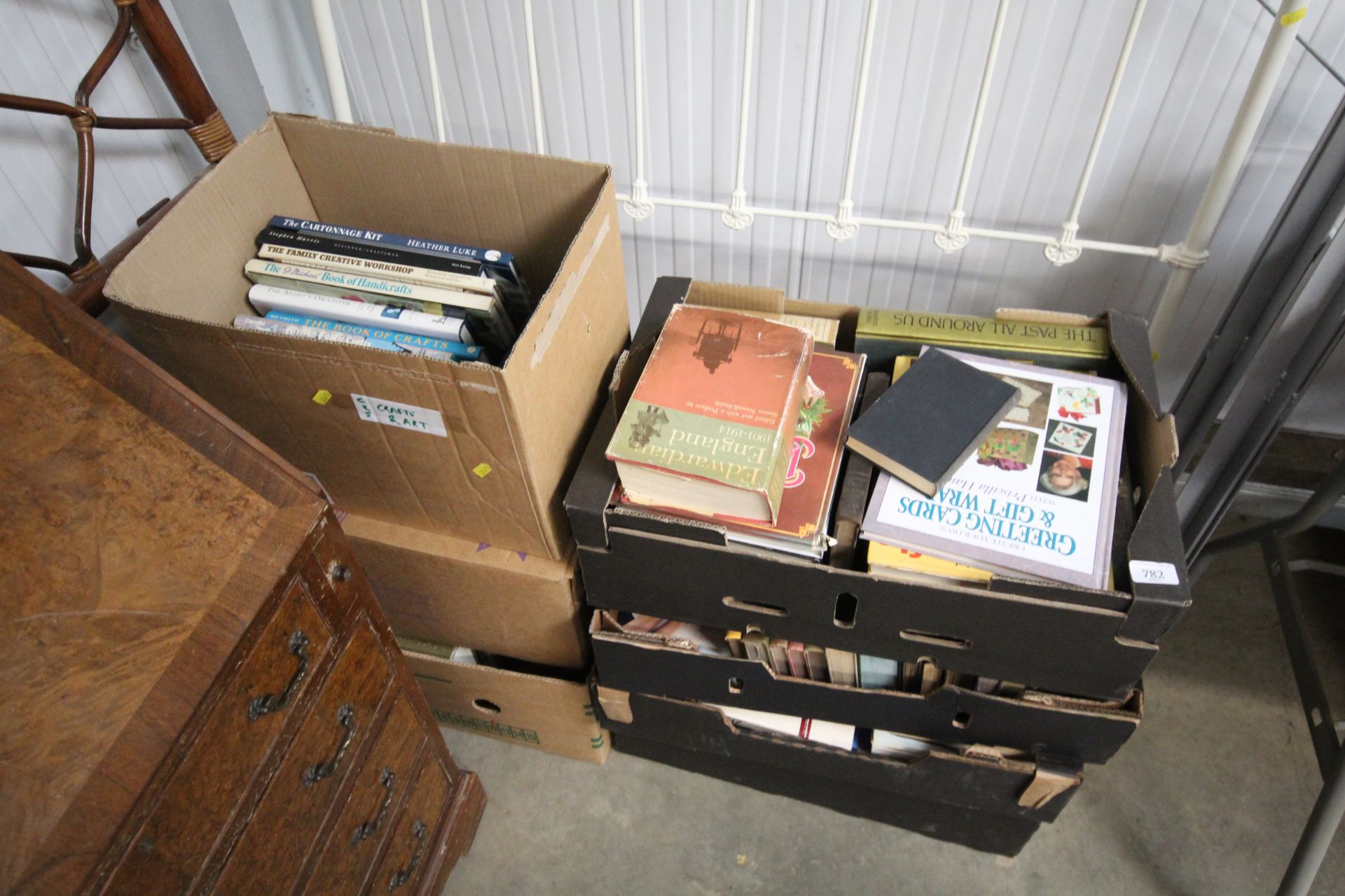 Seven boxes of various books