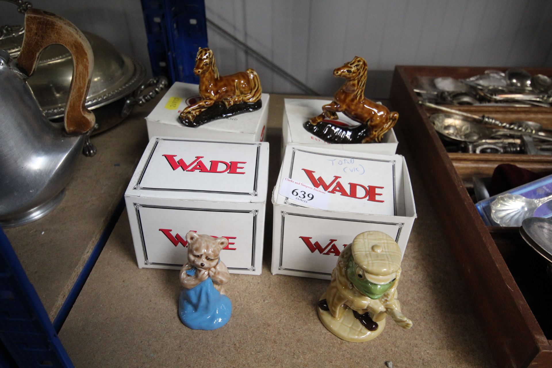 Four boxed Wade ornaments