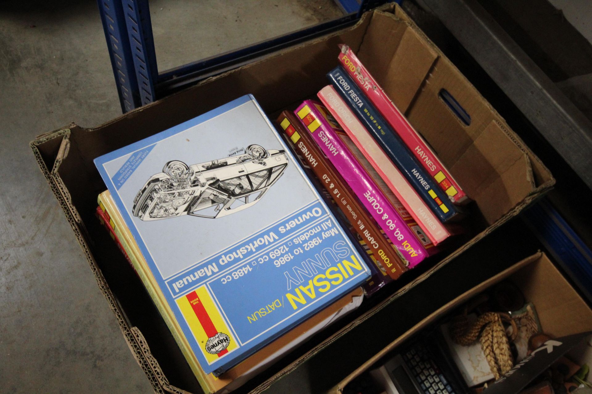 A box of Haynes manuals