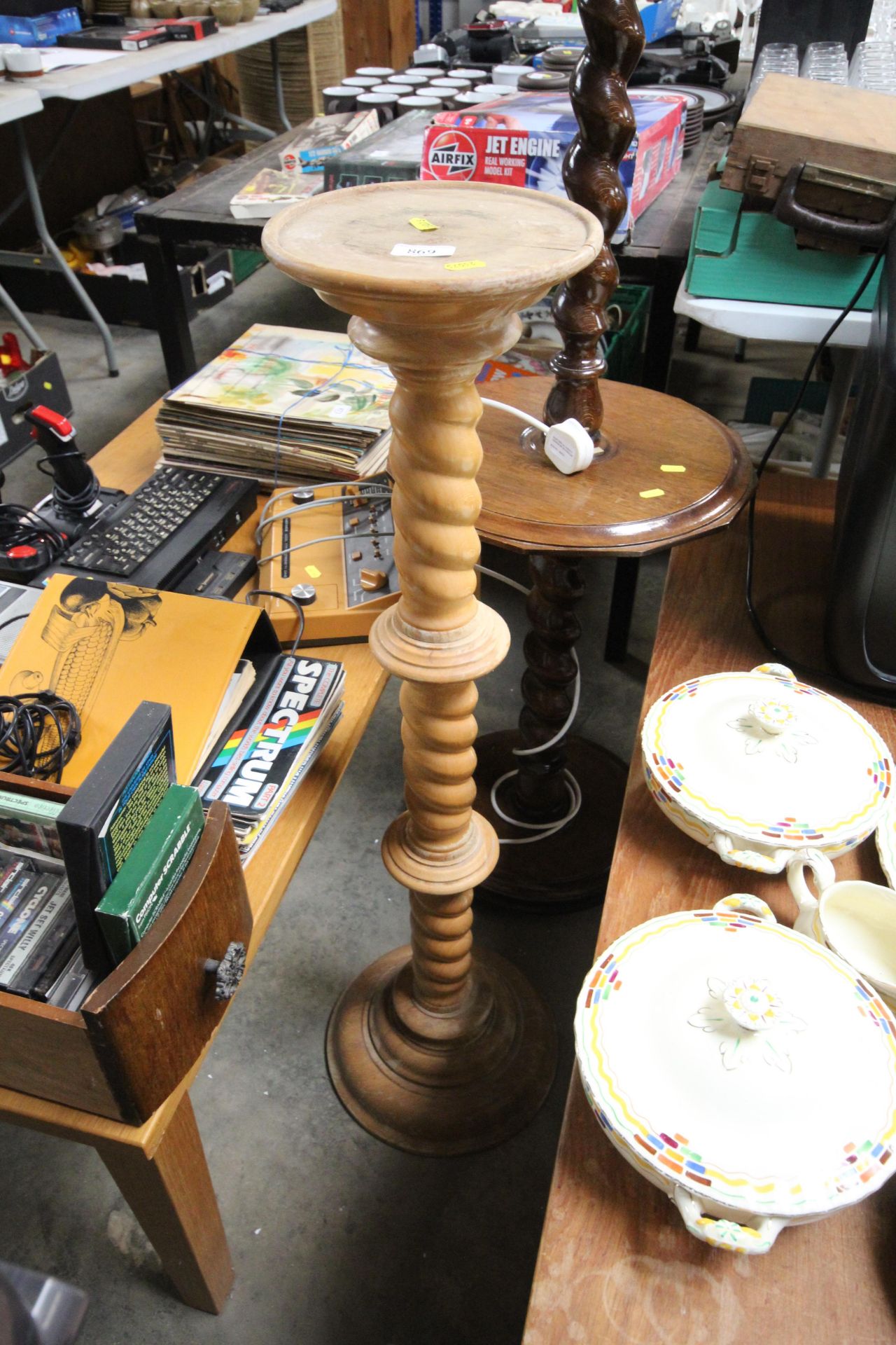 A turned torchere stand