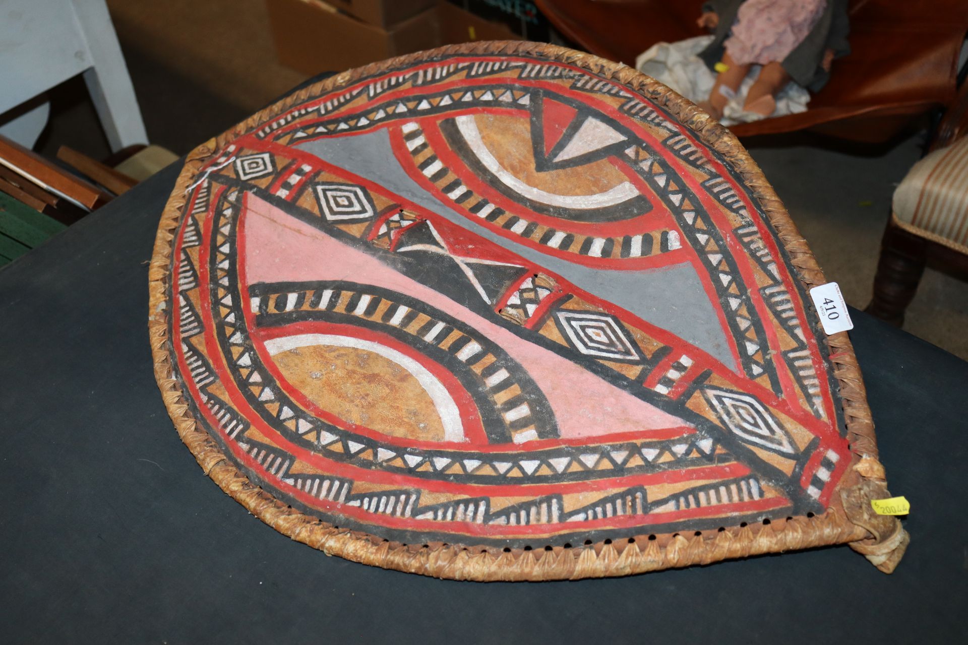 A Zulu hand painted hide warriors shield