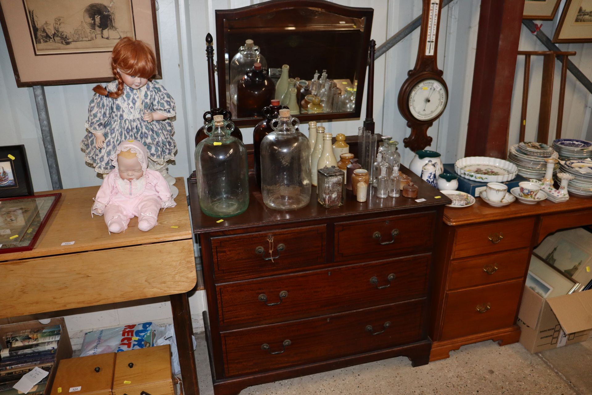 A mahogany dressing chest fitted two short and two