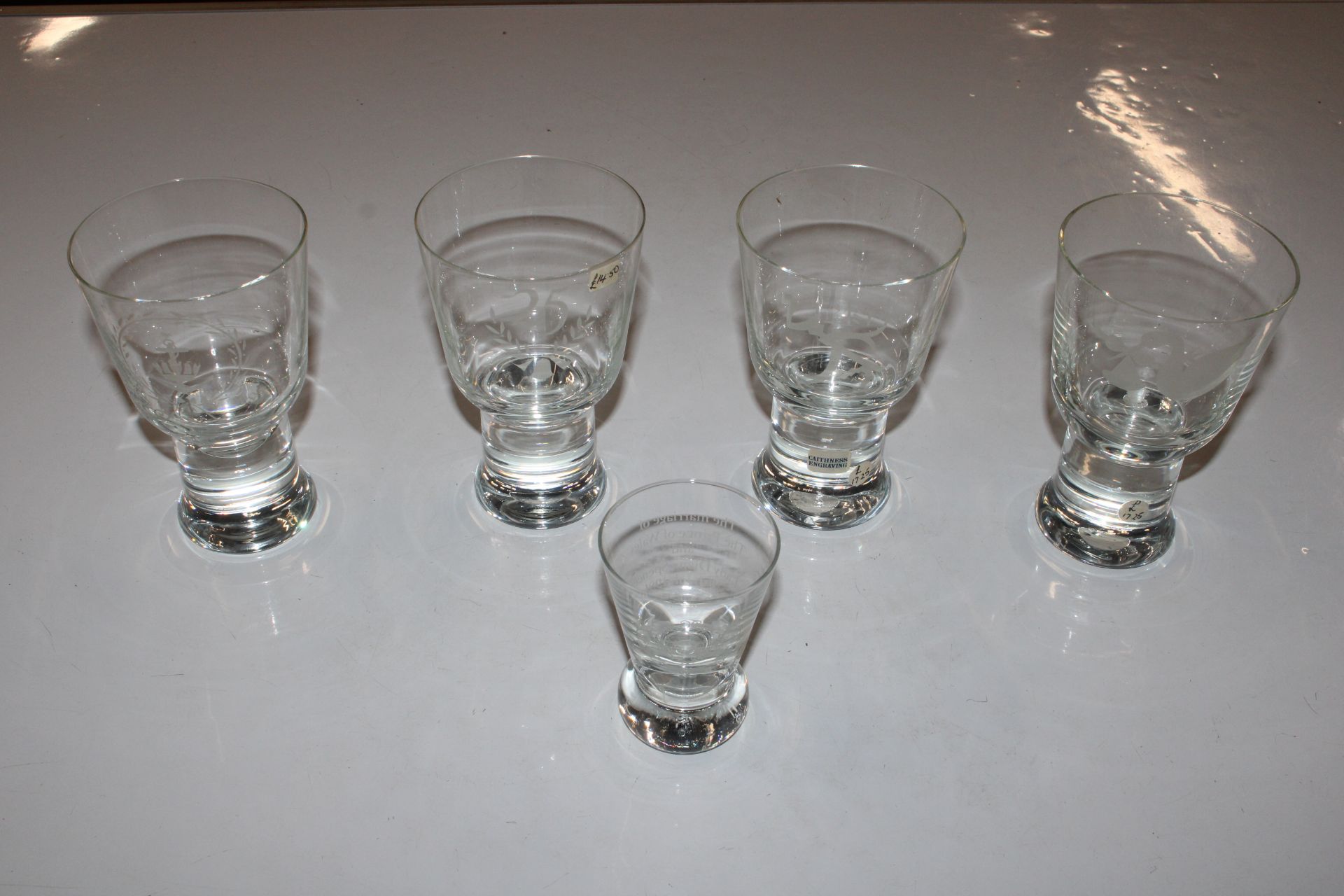 Five Caithness engraved glasses