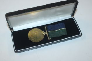 A Scottish Highlander 50th Anniversary medal