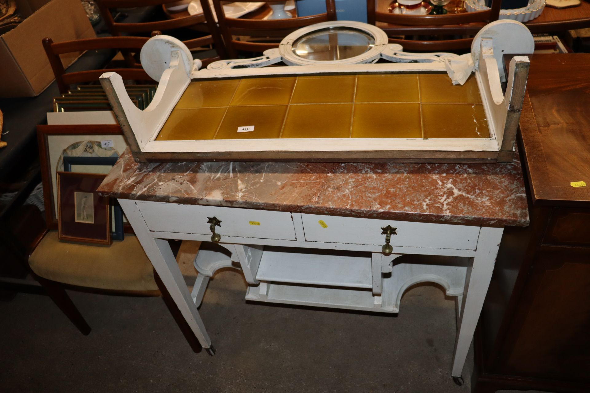 An Edwardian marble top and tile back washstand