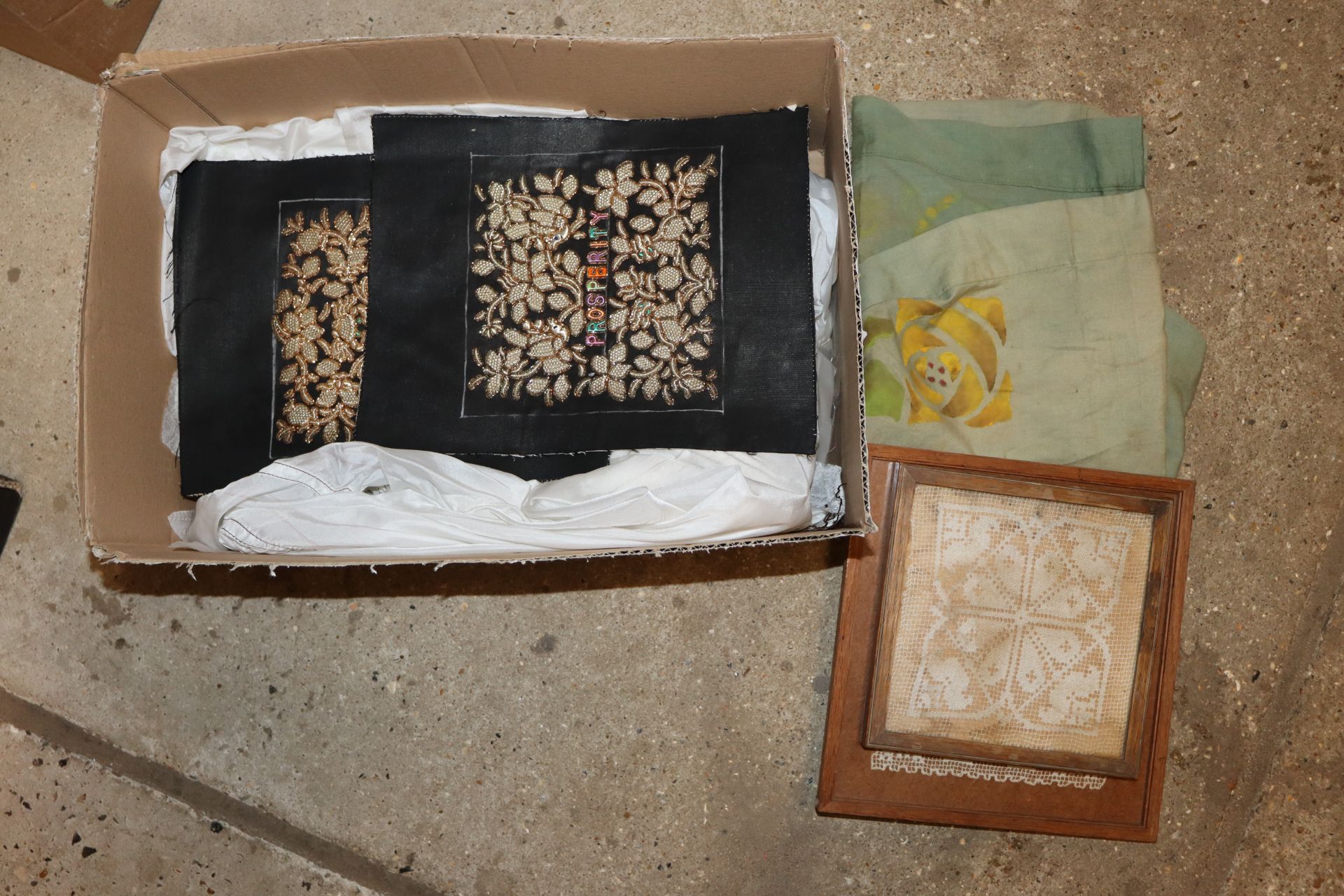 A box of miscellaneous textiles