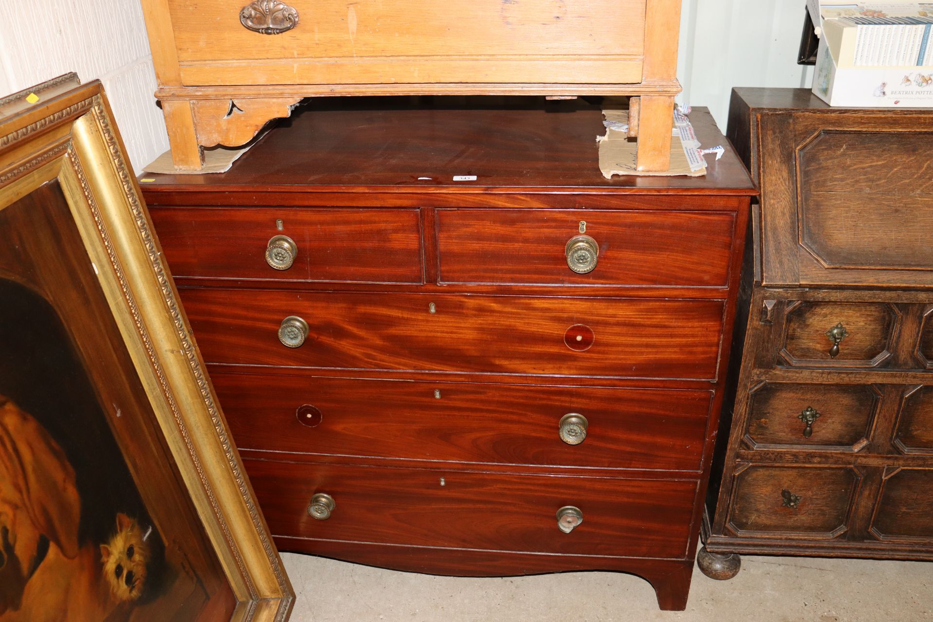 A Georgian mahogany chest of two short and three l