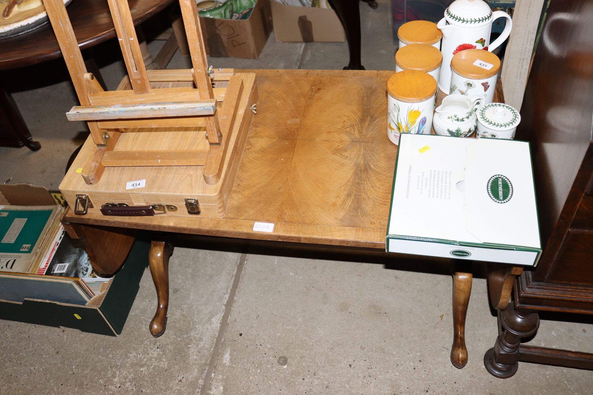 A walnut drop leaf coffee table