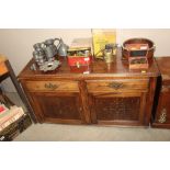 An early 20th Century oak sideboard (reduced in height)