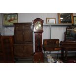 A reproduction mahogany long case clock with chimi