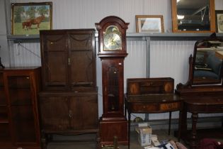 A reproduction mahogany long case clock with chimi