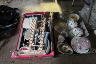 Two tray boxes containing various kitchen items to include glass vases, china, black board etc