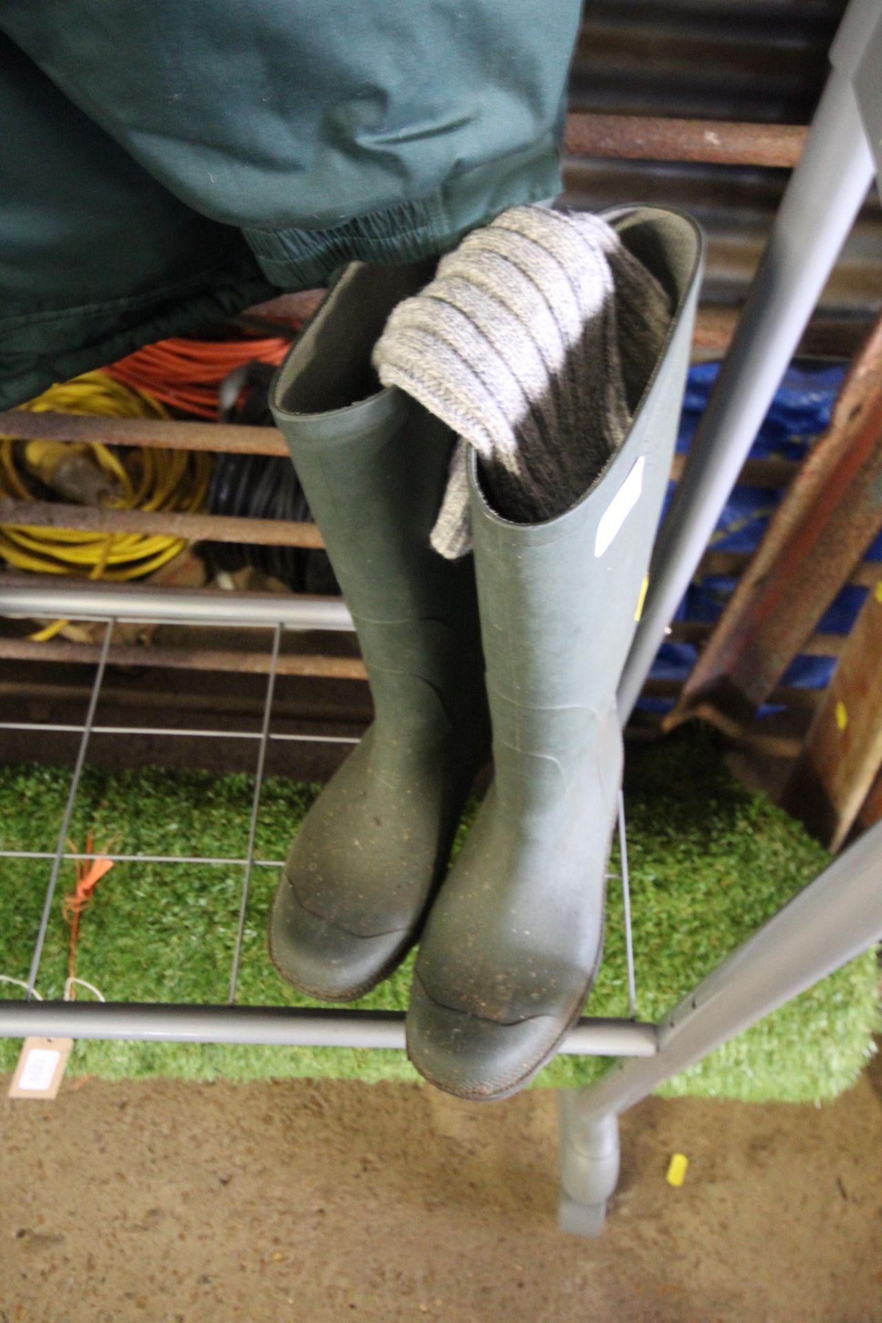 A pair of wellington boots size 7 with socks