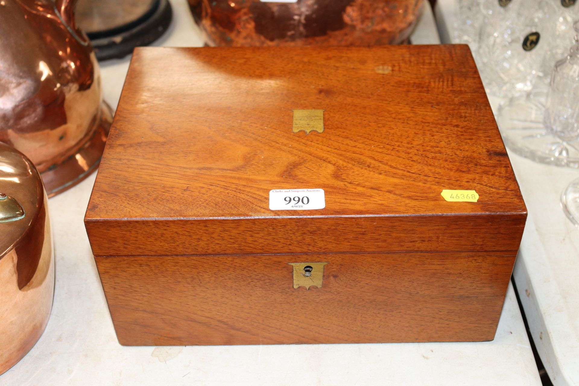 A mahogany and brass inlaid writing box