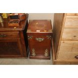 A late Victorian oak and brass mounted coal purdon