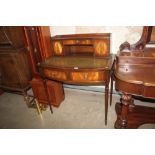 A reproduction mahogany writing desk