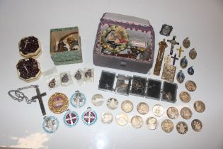 A box containing trinket boxes, various religious