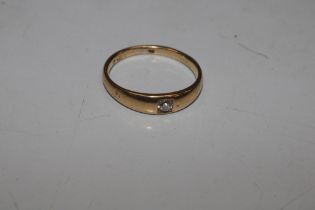 A high carat gold marks rubbed, ring set with soli